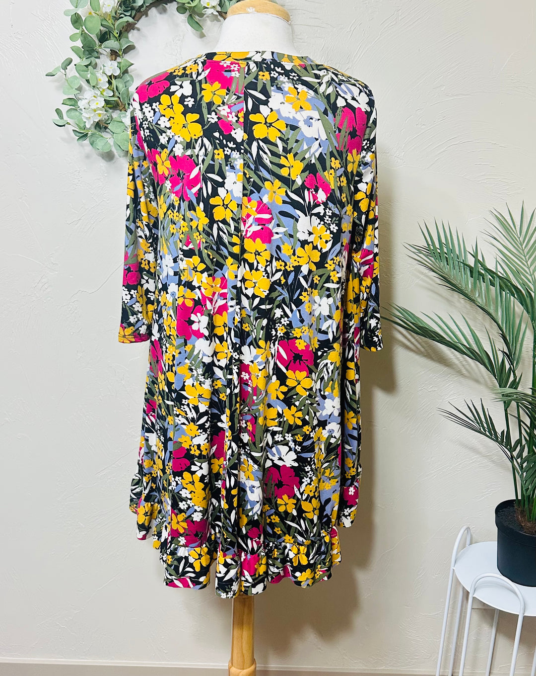 Liza Lou’s Black Background with Floral Hi Low Tunic Top with Ruffle