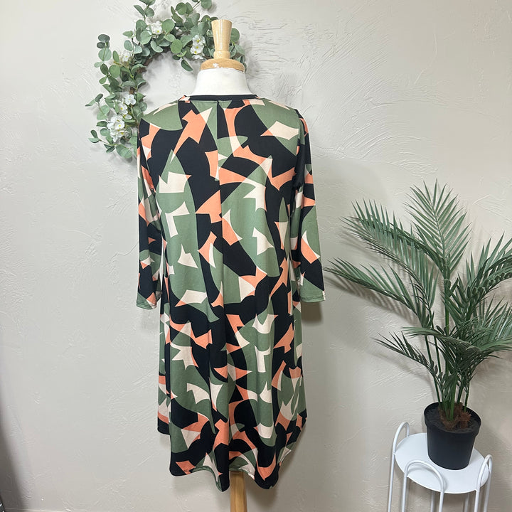 Liza Lou’s Green Geometric Print Tunic Top