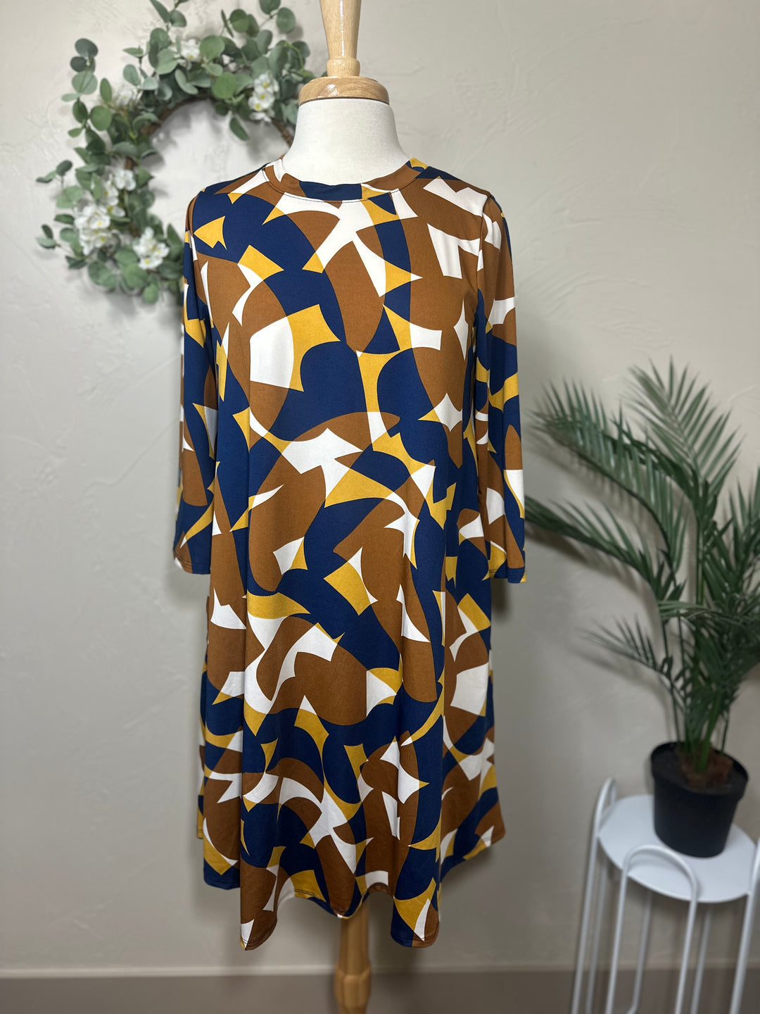 Liza Lou’s Brown & Navy Geometric Print Tunic Top