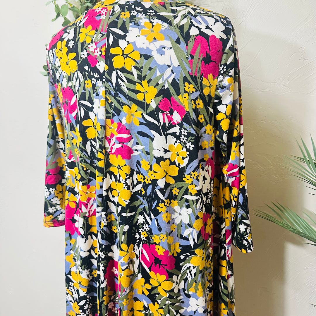 Liza Lou’s Black Background with Floral Hi Low Tunic Top with Ruffle