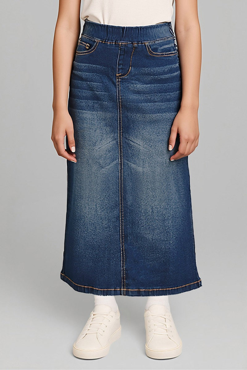 Front of the Girls Stretch Denim Maxi Skirt in a medium blue wash, with an elastic waistband and front pockets