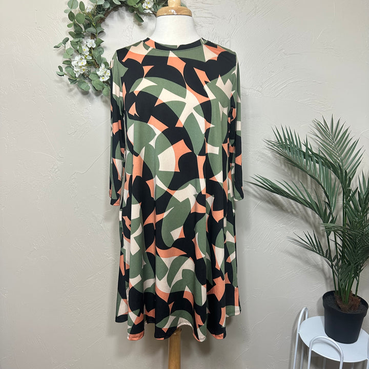 Liza Lou’s Green Geometric Print Tunic Top