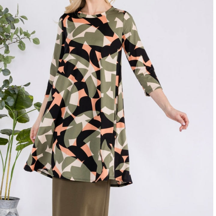 Liza Lou’s Green Geometric Print Tunic Top