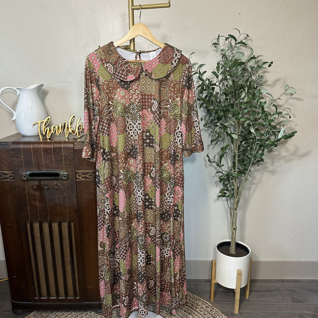 Adrianna Patchwork Dress on hanger, Peter Pan collar modest dress, angled front view