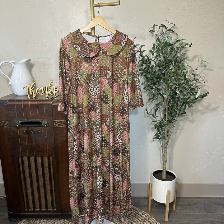 Adrianna Patchwork Dress on hanger, Peter Pan collar modest dress, angled front view