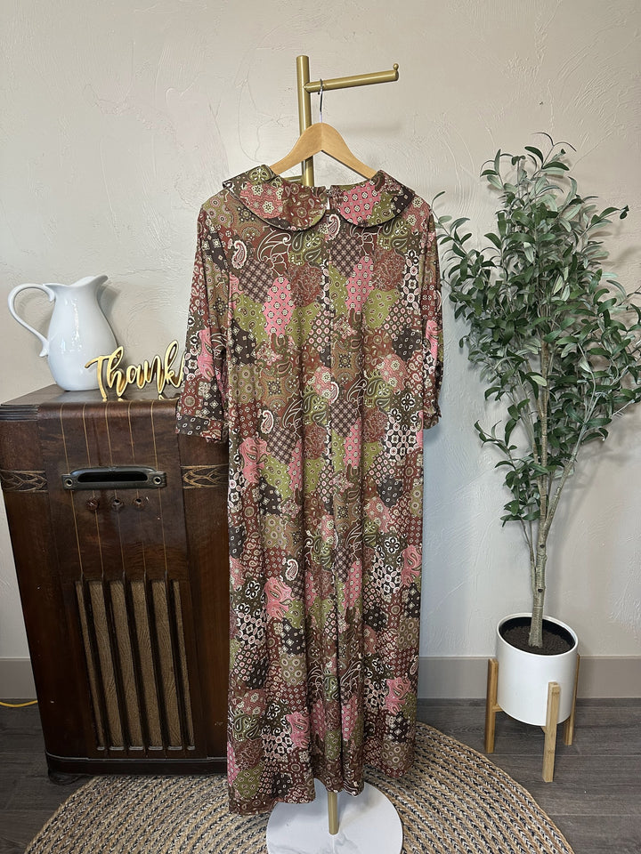Adrianna Patchwork Dress on hanger, rounded collar and patchwork print, back view