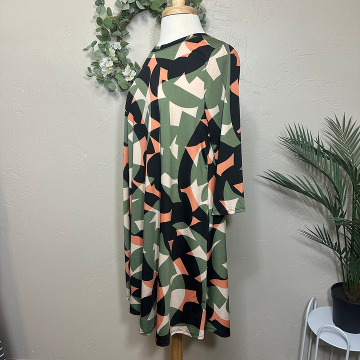 Liza Lou’s Green Geometric Print Tunic Top