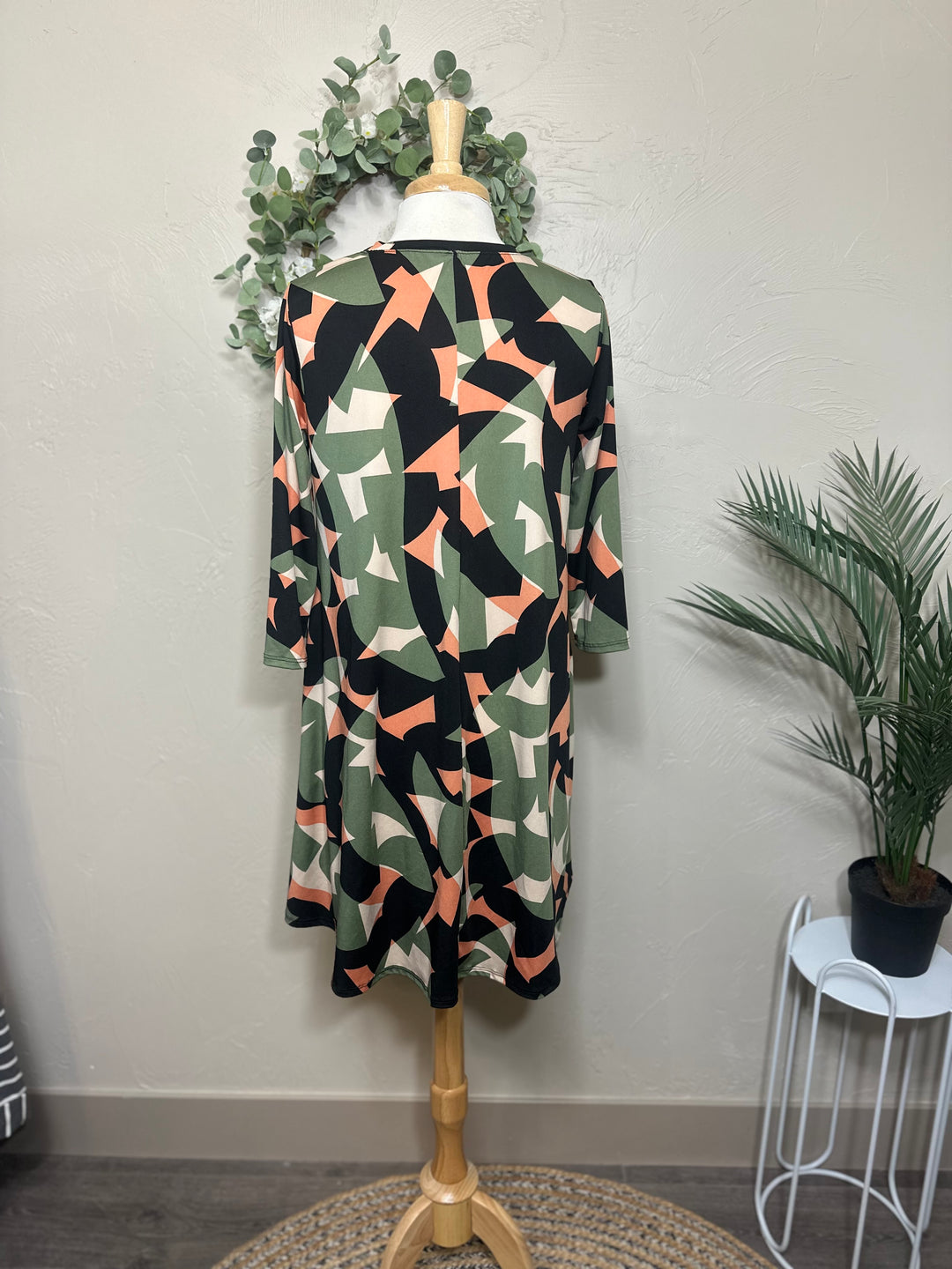 Liza Lou’s Green Geometric Print Tunic Top
