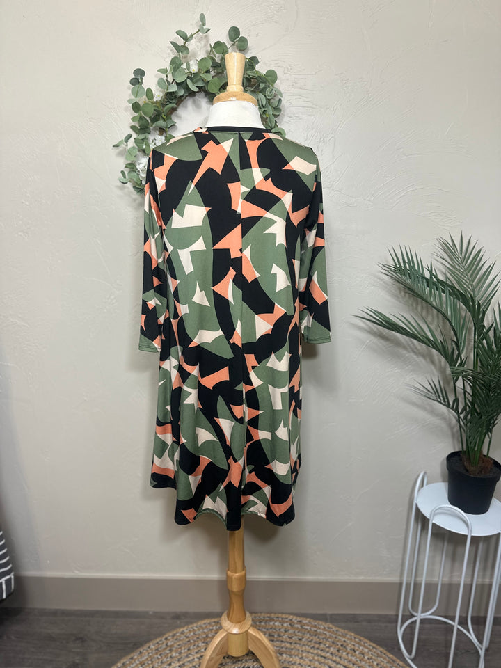 Liza Lou’s Green Geometric Print Tunic Top