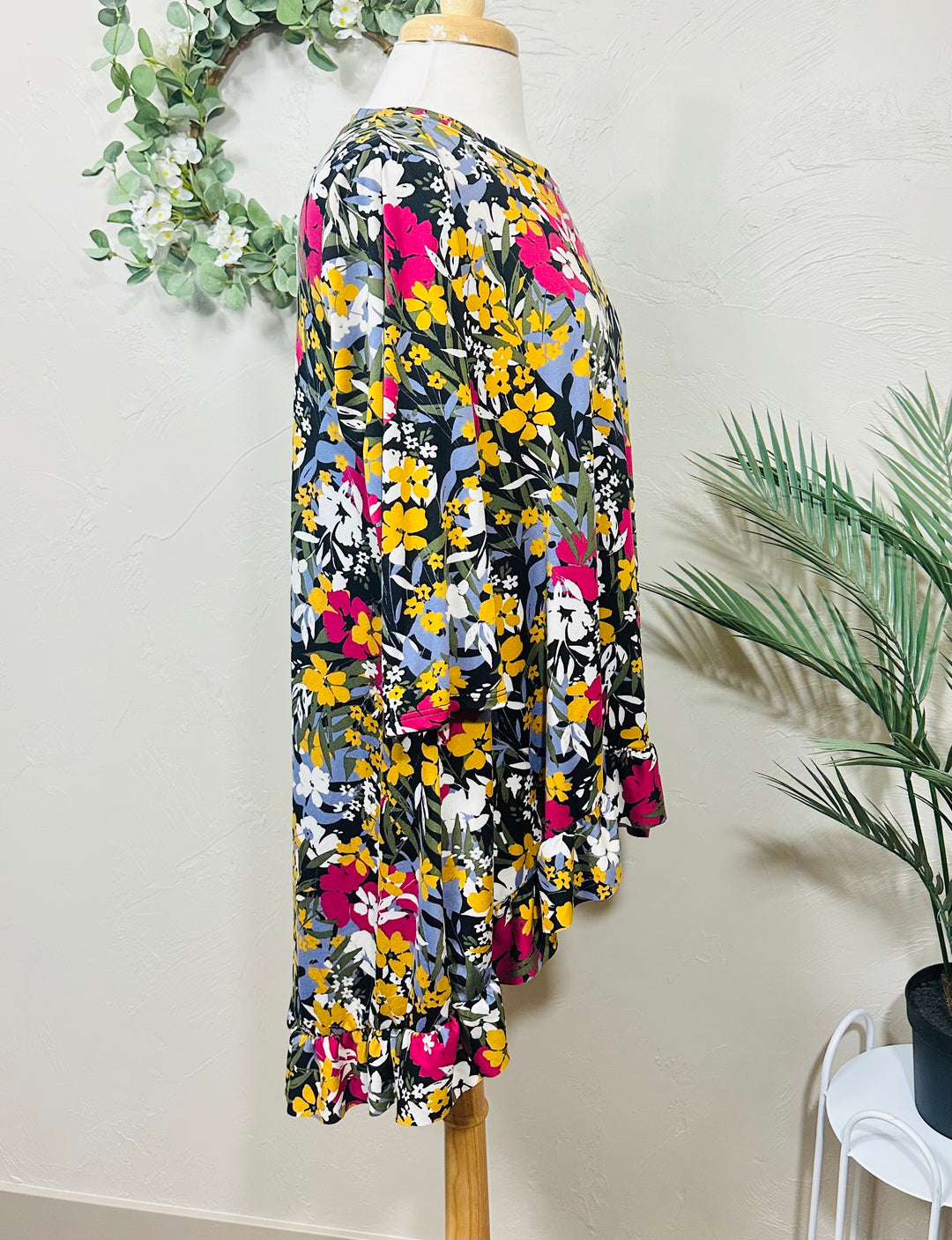 Liza Lou’s Black Background with Floral Hi Low Tunic Top with Ruffle