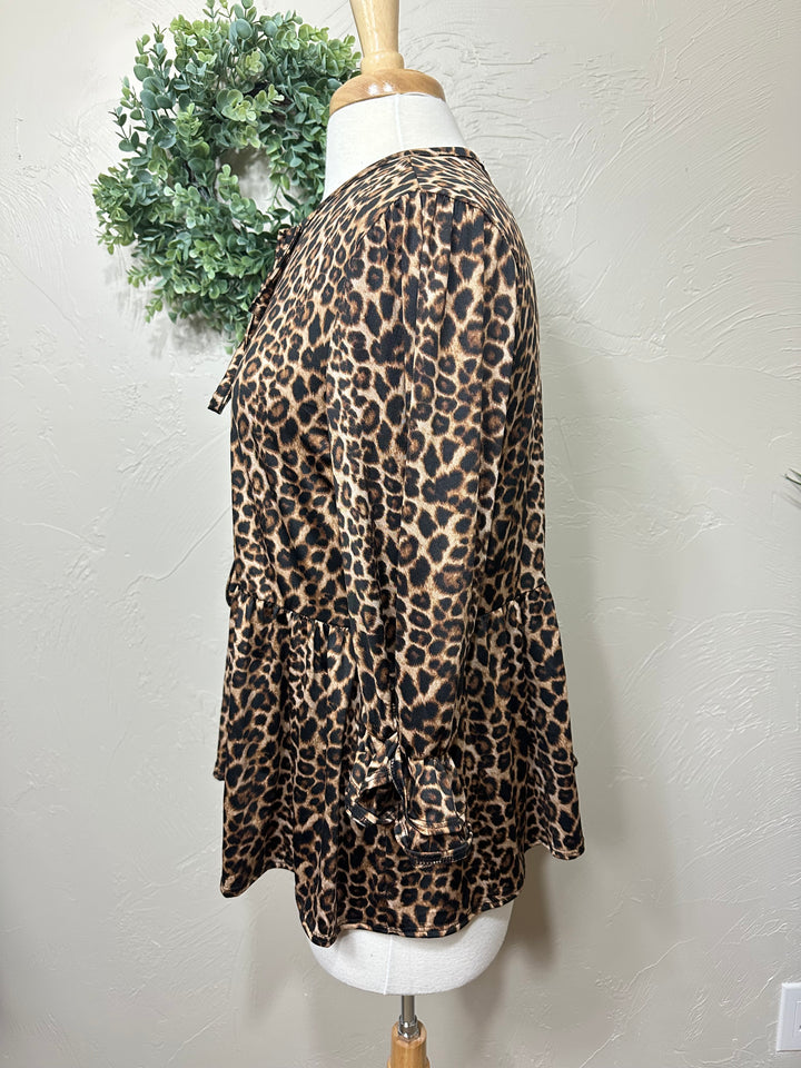 Liza Lou's Animal Print Bow Front Top