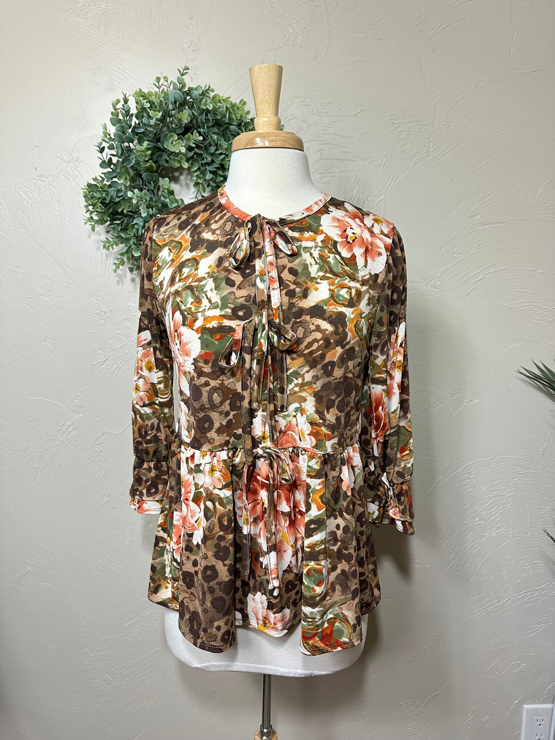 Liza Lou's Animal Print Floral Bow Front Top