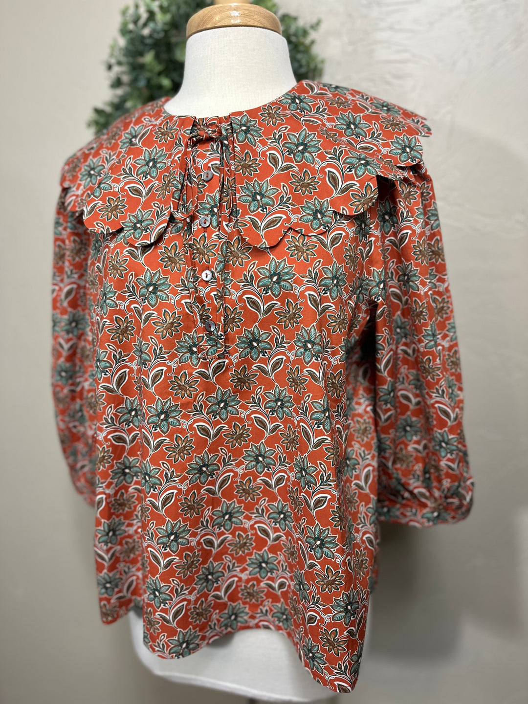 Liza Lou’s Rust Terracotta Paisley Blouse with Peter Pan Collar