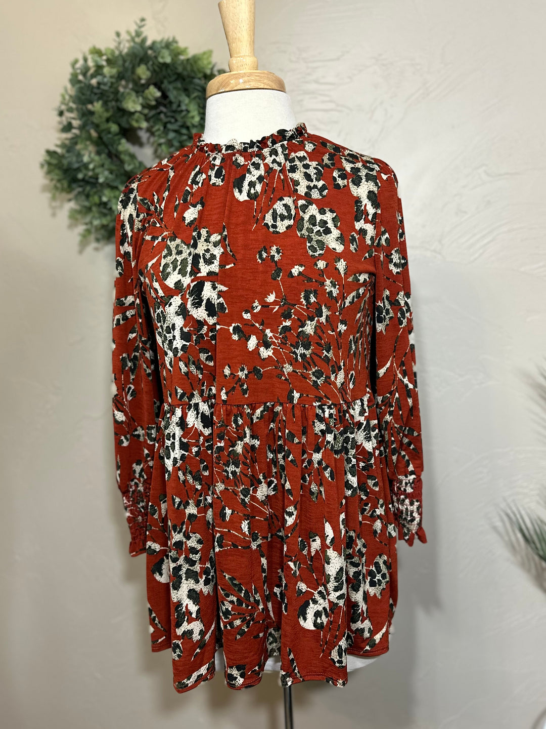 Liza Lou’s Rust Animal Print Tunic Top