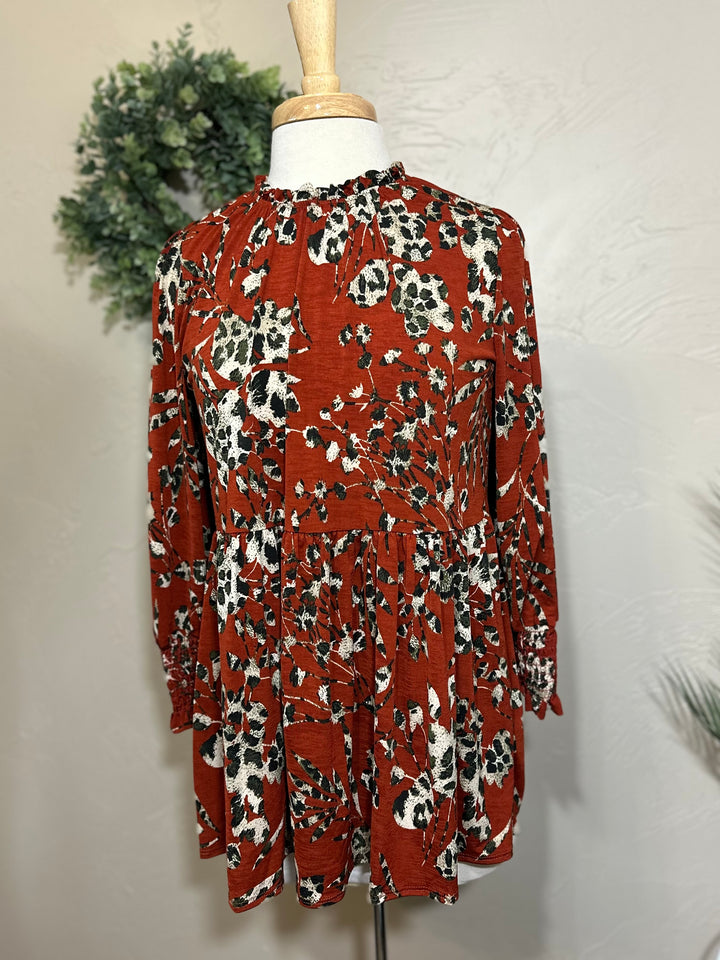 Liza Lou’s Rust Animal Print Tunic Top
