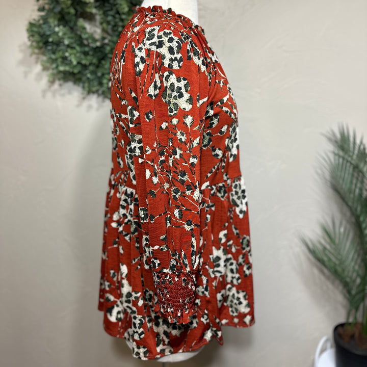 Liza Lou’s Rust Animal Print Tunic Top