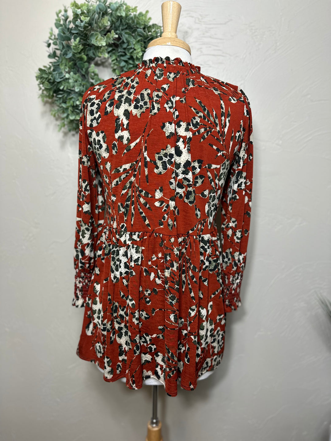 Liza Lou’s Rust Animal Print Tunic Top