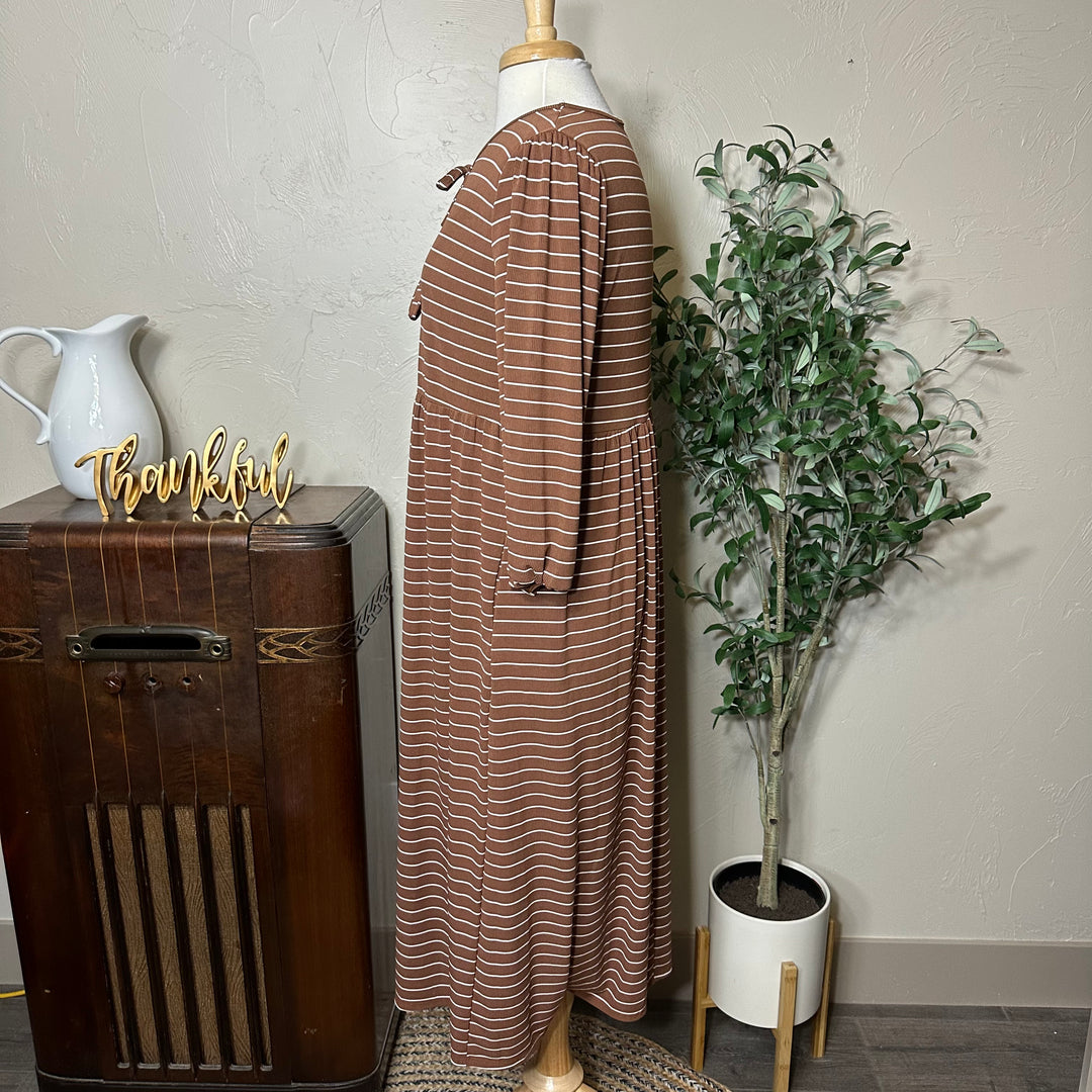 Ellie Triple Bow Striped Dress in toffee brown, side view with pockets
