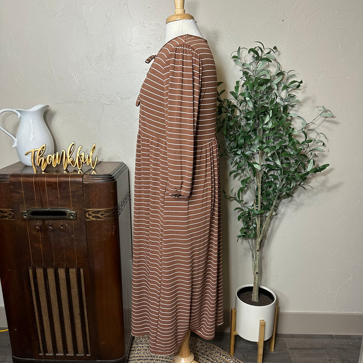 Ellie Triple Bow Striped Dress in toffee brown, side view with pockets