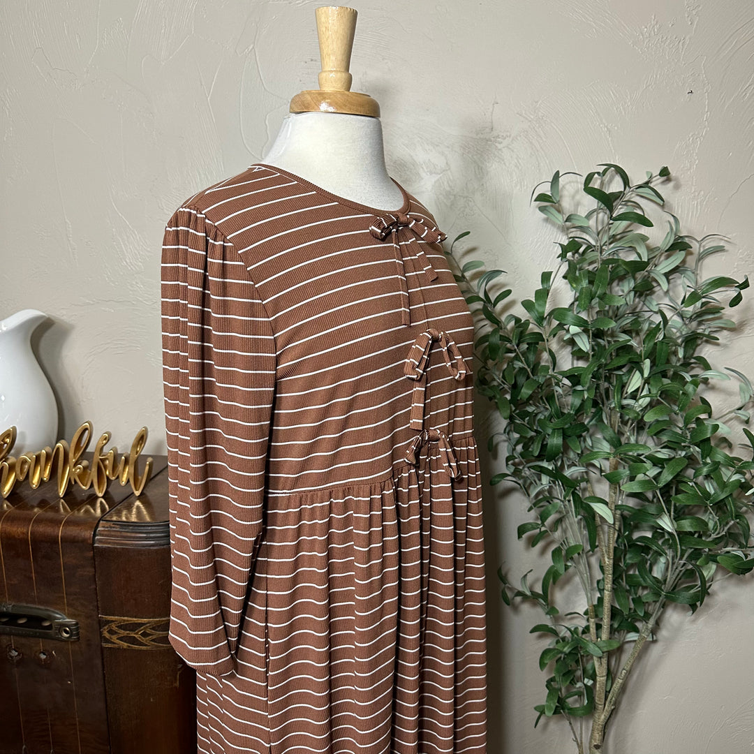 Ellie Triple Bow Striped Dress in toffee brown, puffed 3/4 sleeves, angled view