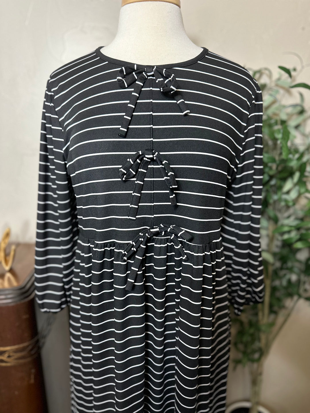Ellie Triple Bow Striped Dress in black, striped bow detail close-up