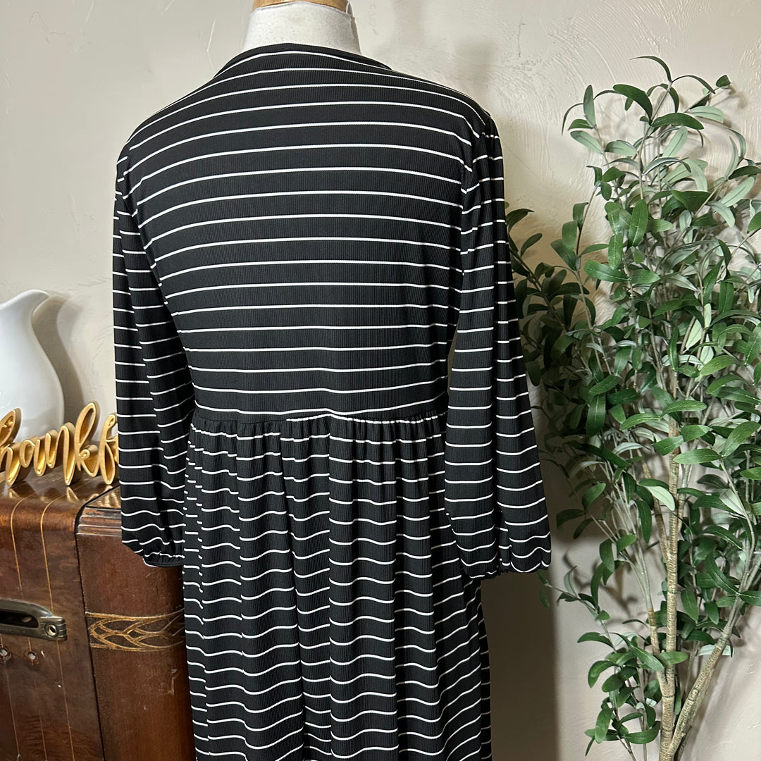 Ellie Triple Bow Striped Dress in black, gathered waist, upper back view