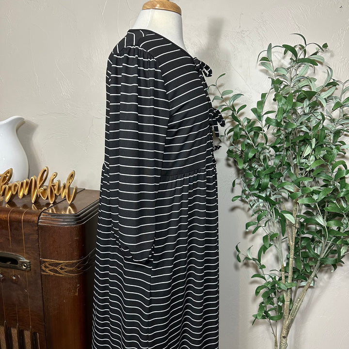 Ellie Triple Bow Striped Dress in black, gathered shoulder and bows, upper side view