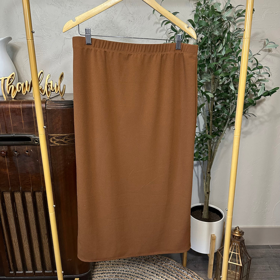 Juliette Pull-On Midi Skirt in maple brown, solid color with elastic waist, front view on hanger