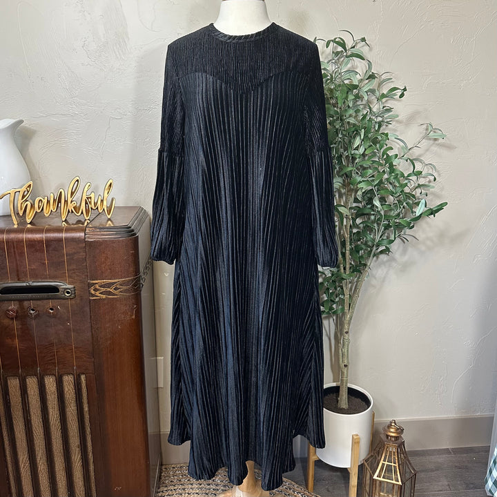 Evelyn Pleated Velvet Midi Dress in black, curved front yoke and full skirt, front view