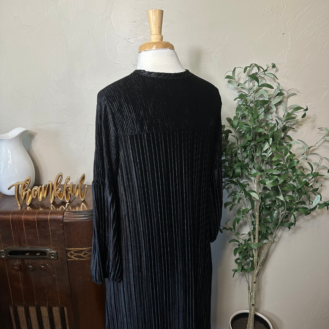 Evelyn Pleated Velvet Midi Dress in black, back yoke and pleated velvet texture, close-up