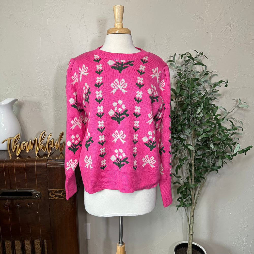Rosie Bow and Flower Pullover Sweater in pink, round ribbed neckline and long sleeves, front view