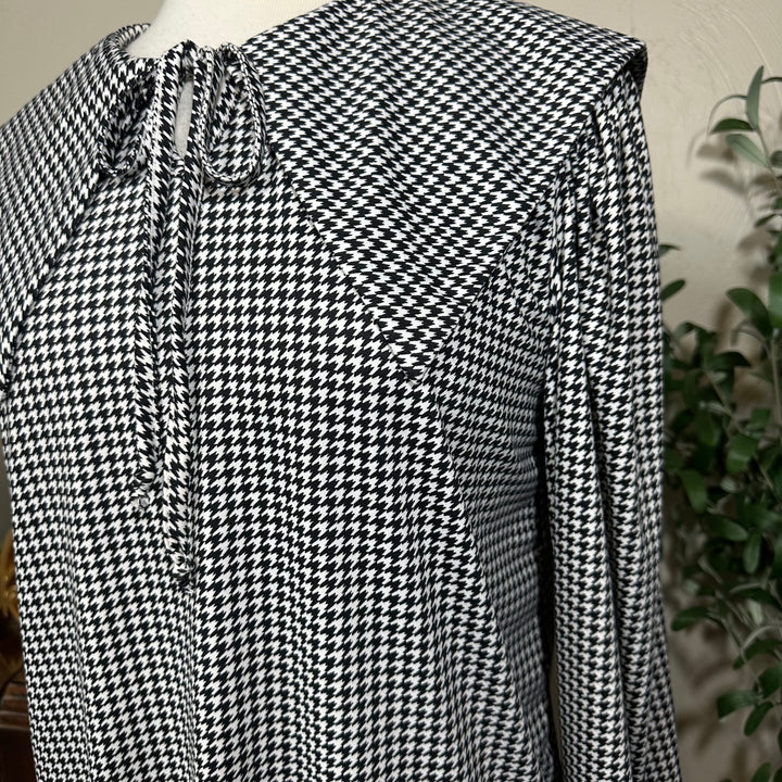Hollis Houndstooth Sailor Collar Top in black and white, sailor collar and tie, angled close-up