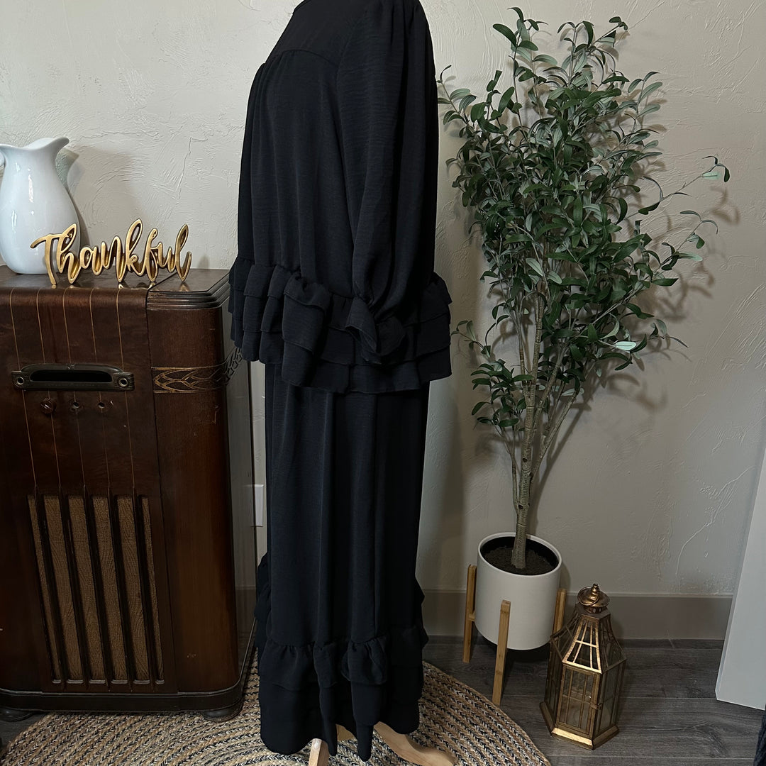 Hattie Tiered Ruffle Top in black, side view with matching skirt