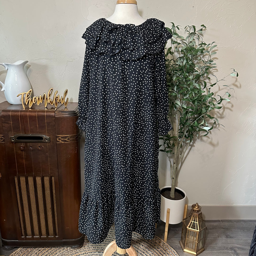 Clara Ruffle Collar Polka Dot Dress, full front view with the bow tie neckline, long sleeves and ruffle hem