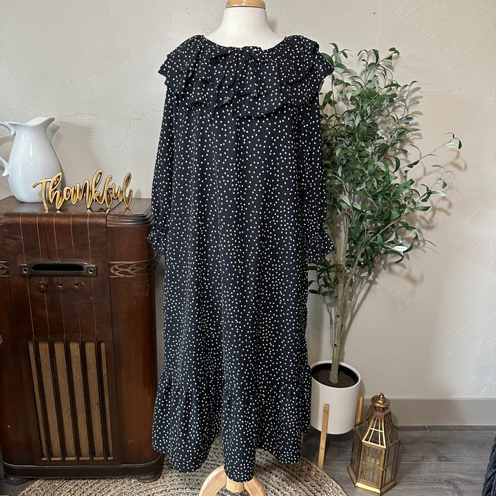 Clara Ruffle Collar Polka Dot Dress, full front view with the bow tie neckline, long sleeves and ruffle hem