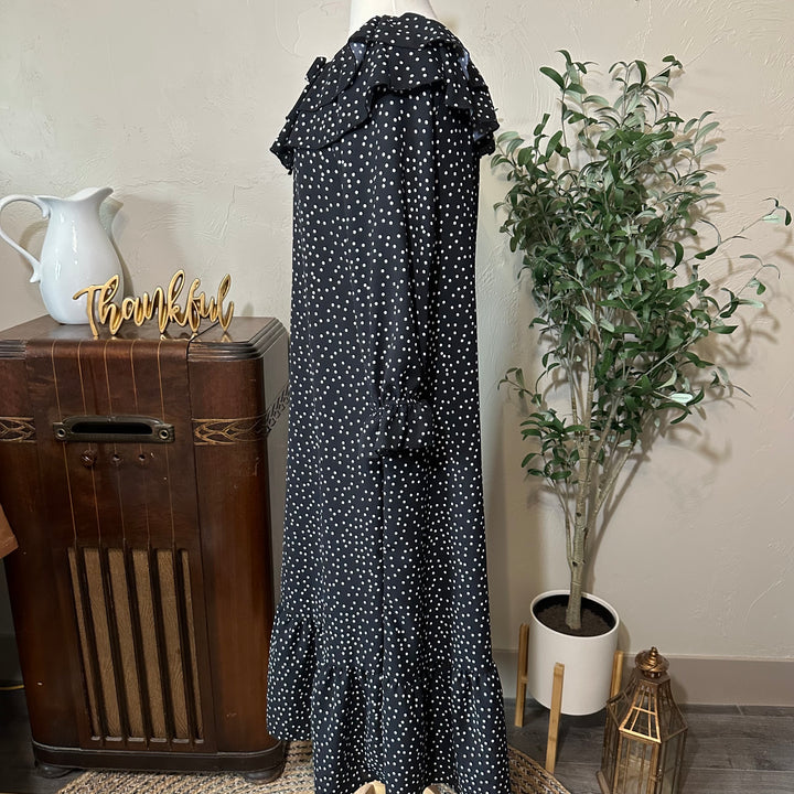 Side profile of the Clara dress from collar to hem