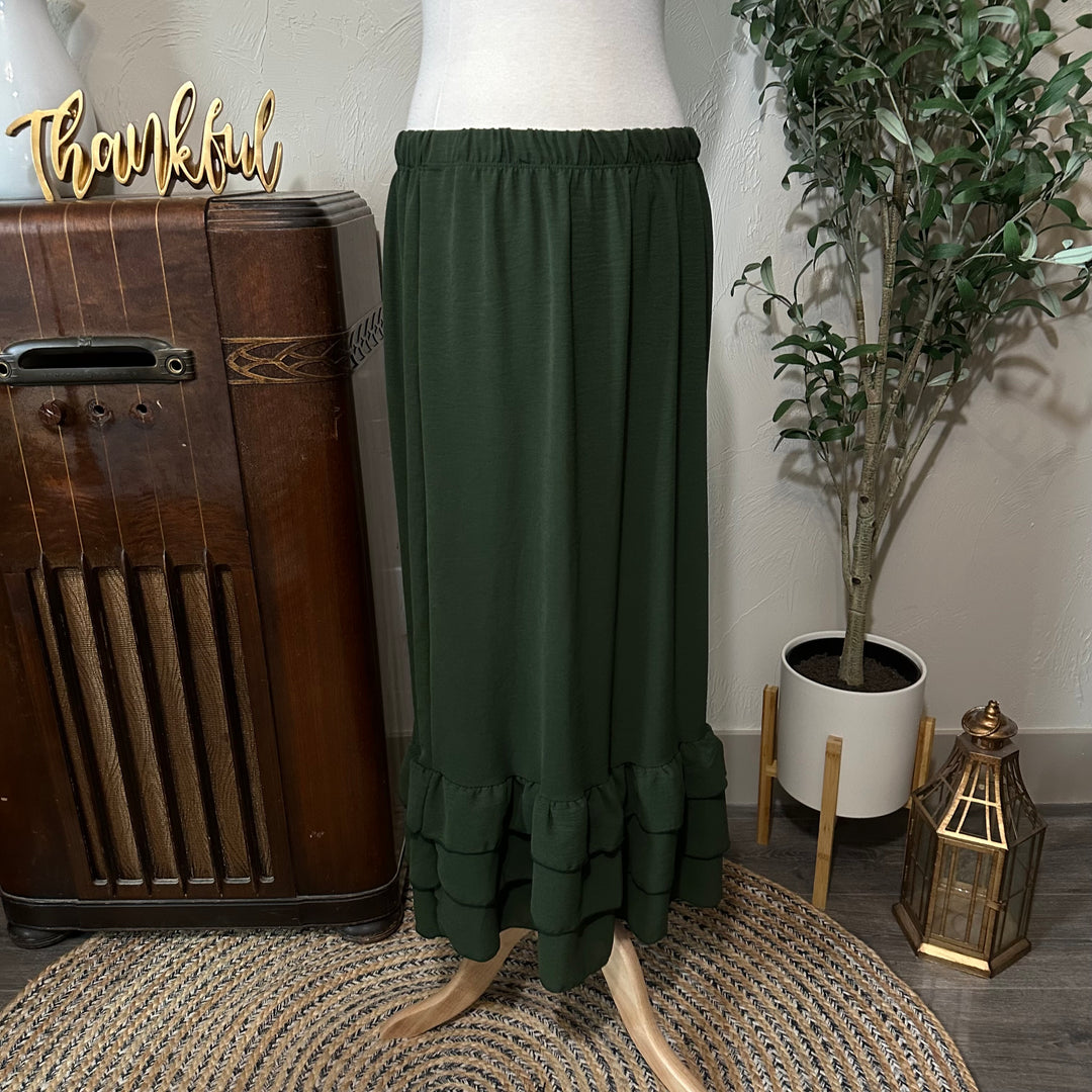 Matching olive tiered ruffle skirt with elastic waist, sold separately, front view