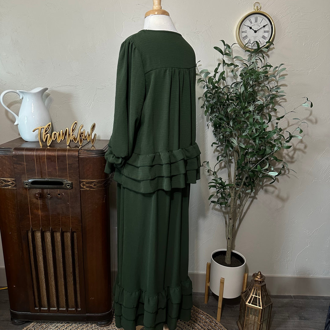 Hattie Tiered Ruffle Skirt in olive, worn with the matching Hattie top, back three-quarter view