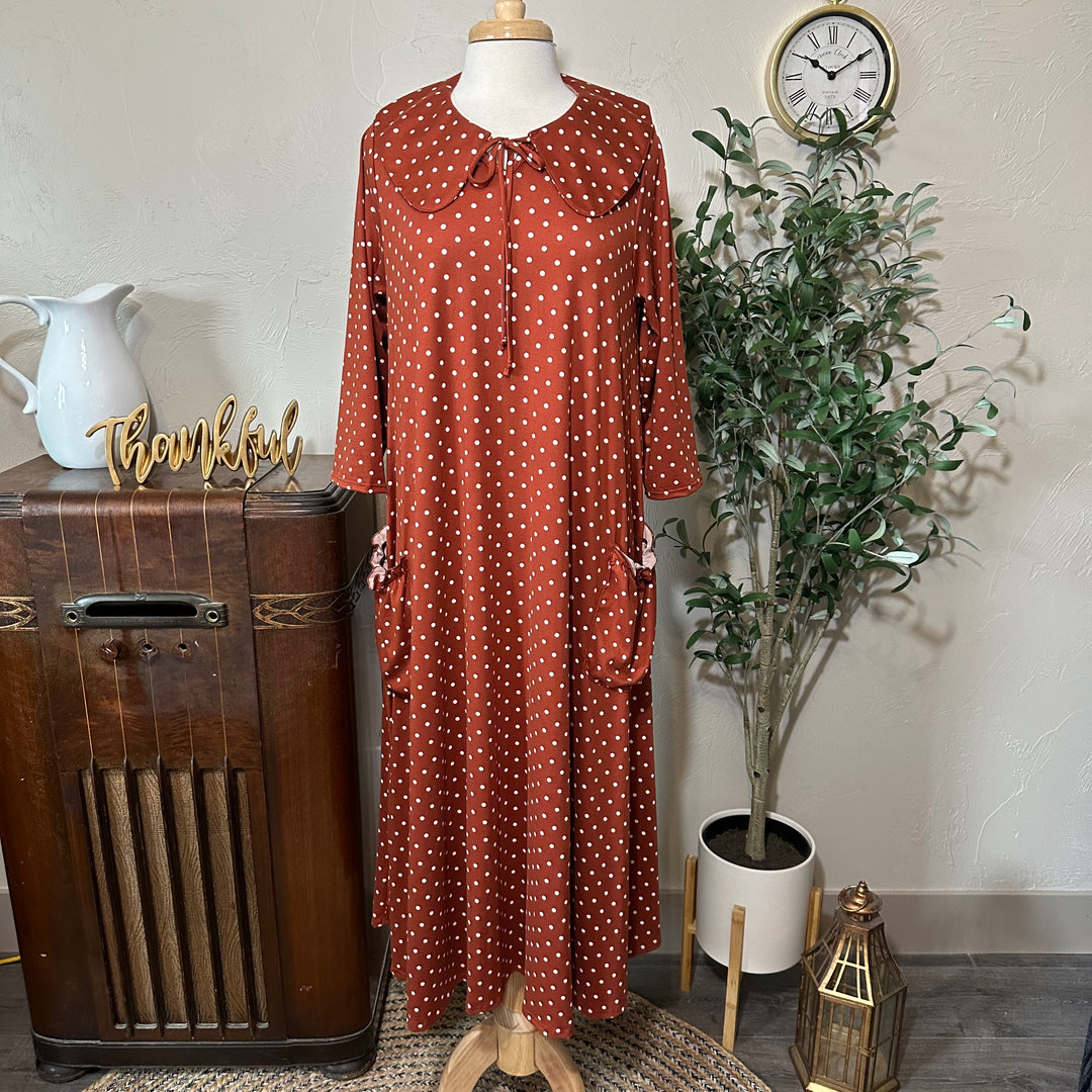 Ginny Peter Pan Collar Polka Dot Dress in rust, cream dots and gathered pockets, full front view