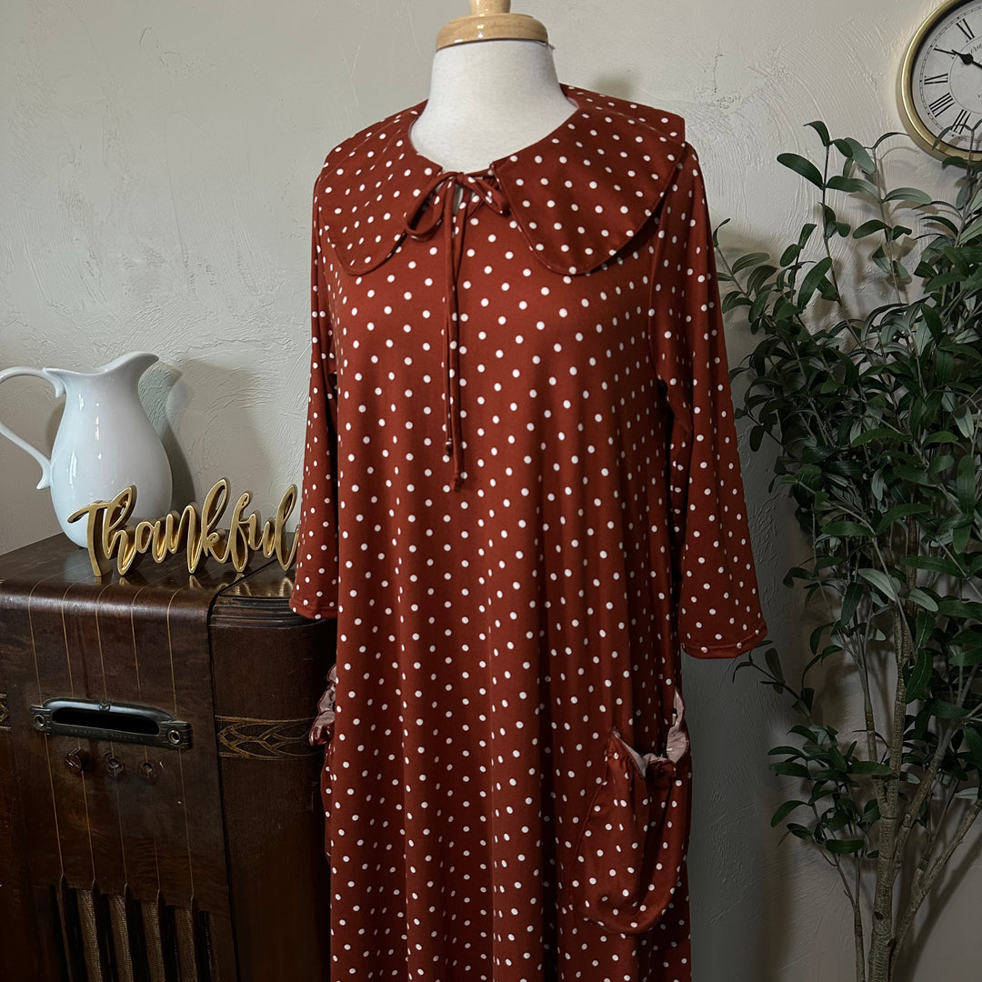 Ginny Peter Pan Collar Polka Dot Dress in rust, collar and 3/4 sleeves, three-quarter view