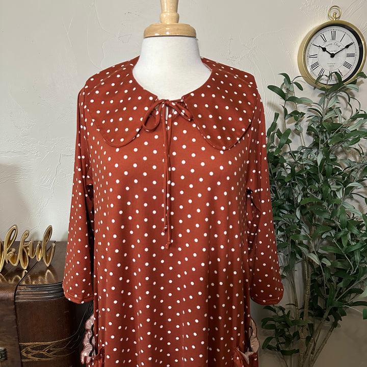 Ginny Peter Pan Collar Polka Dot Dress in rust, rounded collar and neck tie, front close-up