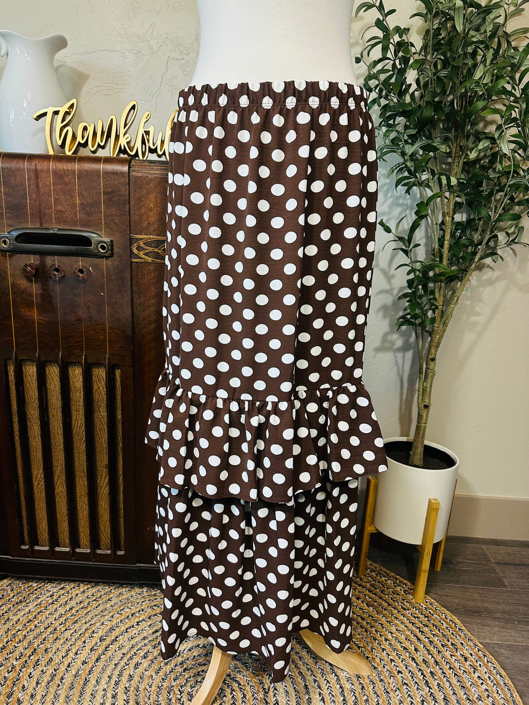 Betty Lou Polka Dot Tiered Maxi Skirt in brown, white polka dots, angled view