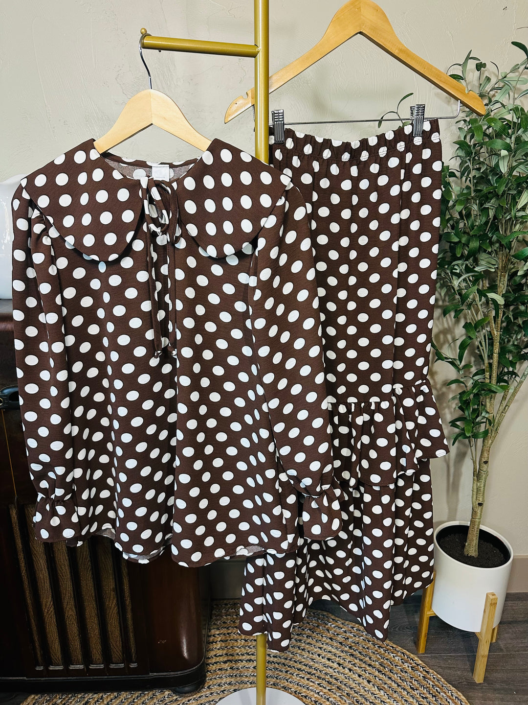 Betty Lou Polka Dot Tiered Maxi Skirt in brown, matching polka dot set shown on hangers