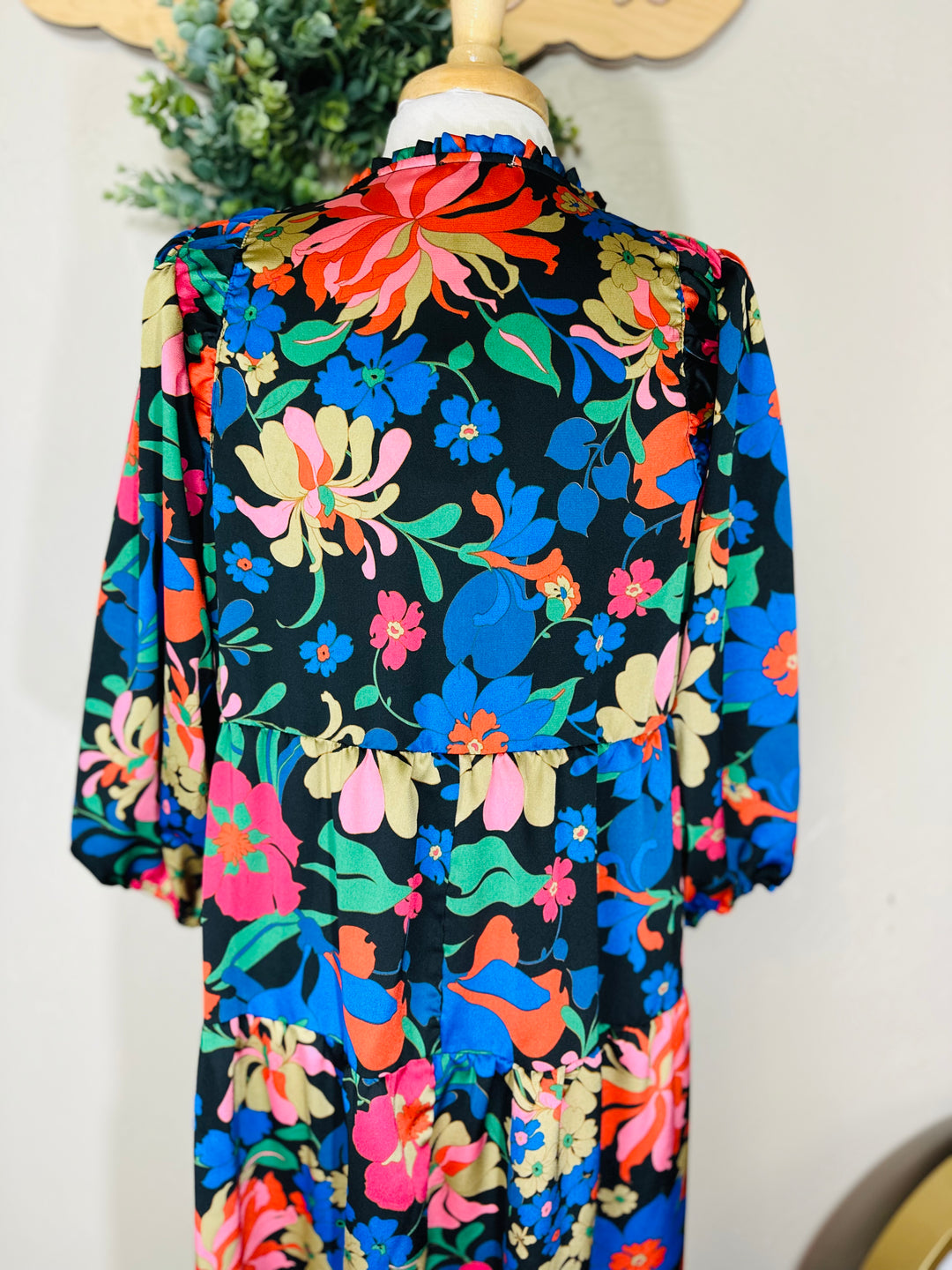 Liza’s Umgee Colorful Floral Tiered Dress Black Background