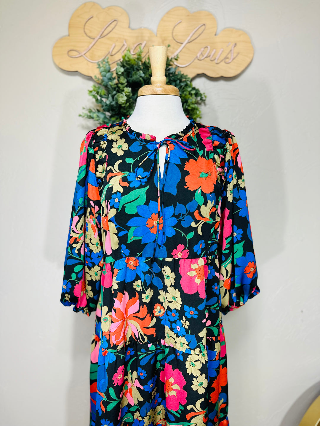 Liza’s Umgee Colorful Floral Tiered Dress Black Background